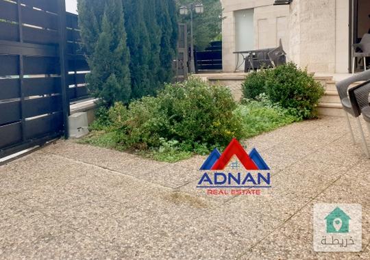 شقة ارضية مع حديقة مفروشة للإيجار قرب جبل عمان