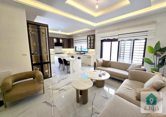 ضاحية الامير راشد شقة ارضية فخمة مفروشة مع تراس وكراج ومدخل خاص 