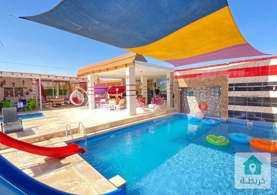 مزرعة وشاليه مميز وفخم على طريق المطار للبيع 