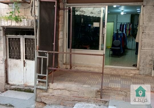 محل تجاري بسوق البالة اربد  للبيع