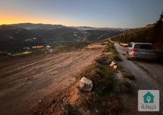 قطعة أرض مميزة مطلة على الشارع الرئيسي عمان جرش تبعد عن دوار صويلح 15
