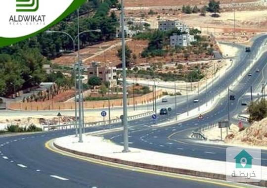 ارض للبيع قرب شارع عمان التنموي  شارع ال100 مساحة 72دونم