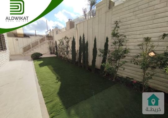 شقة للبيع في ام السماق قرب مكة مول طابق تسوية مساحة البناء 190م ومساحة الحديقة 170م