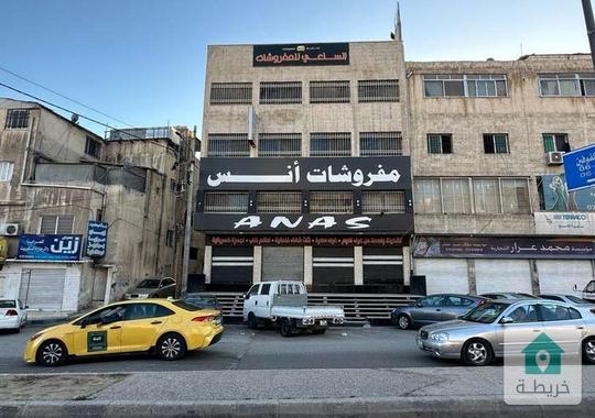 مجمع تجاري للبيع(الدخل سنوي 20,000)موقع مميز شارع الأردن على اشارات النزهة