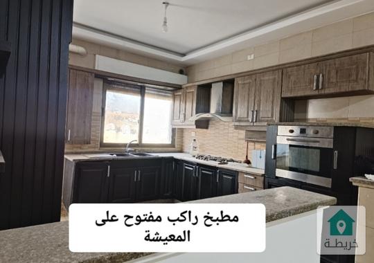 شقة شبه ارضي للبيع بربوة عبدون 65 الف