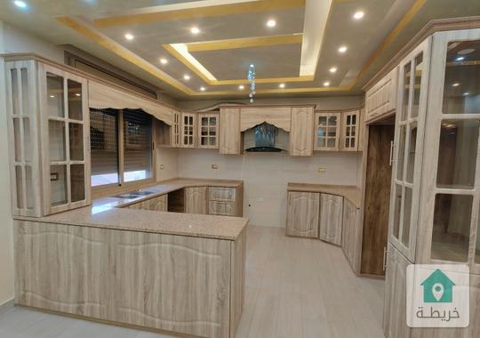 شقه للبيع طابق ارضي مع ترس واسع حي فلل شفا بدران قرب جامعه علوم تطبيقيه أقساط بدون بنوك مع مطبخ راكب