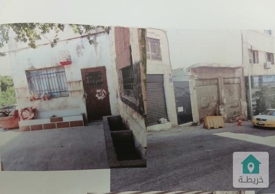 بناء تجاري في حي جبل القلعة منطقة المدينة للبيع 