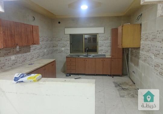 الزرقاء الجديدة بجاتب كنيسة المار بوسف 