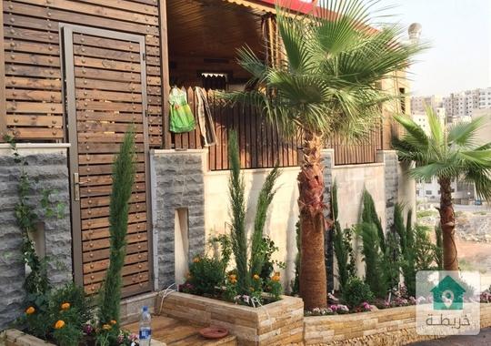 شقه ارضيه فخمه بطبربور مساحه 150متر داخلي و50م خارجي  للبيع بسعر 59 الف ت0796974924