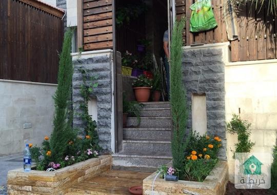 شقه ارضيه فاخره للبيع في طبربور مساحة 150م داخلي خارجي 50م للبيع بسعر 63الف ت0798120355