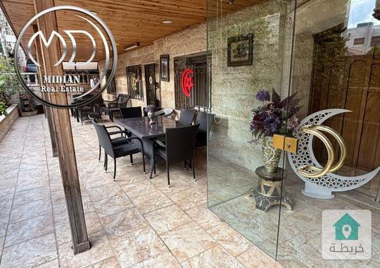 شقة ارضية للبيع ام السماق مساحة 180م مع ترس و حديقة 200م تشطيبات و ديكورات عصرية فاخرة بسعر مميز جدا