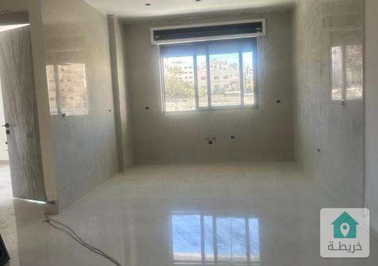 شقة ب 100 متر ب 52الف في البنيات قرب مدارس الحصاد 