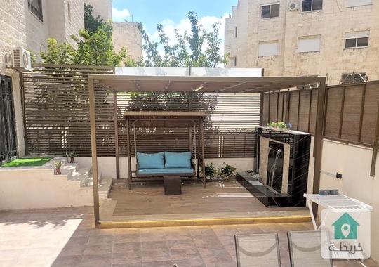 الرابيه شقة ارضية مع حديقة و كراج خاص محدثة بالكامل
