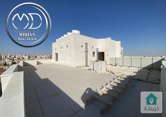 شقة دوبلكس جديدة طابق اخير مع روف للبيع الرابية مساحة 205م مع تراسات تشطيبات سوبر ديلوكس 